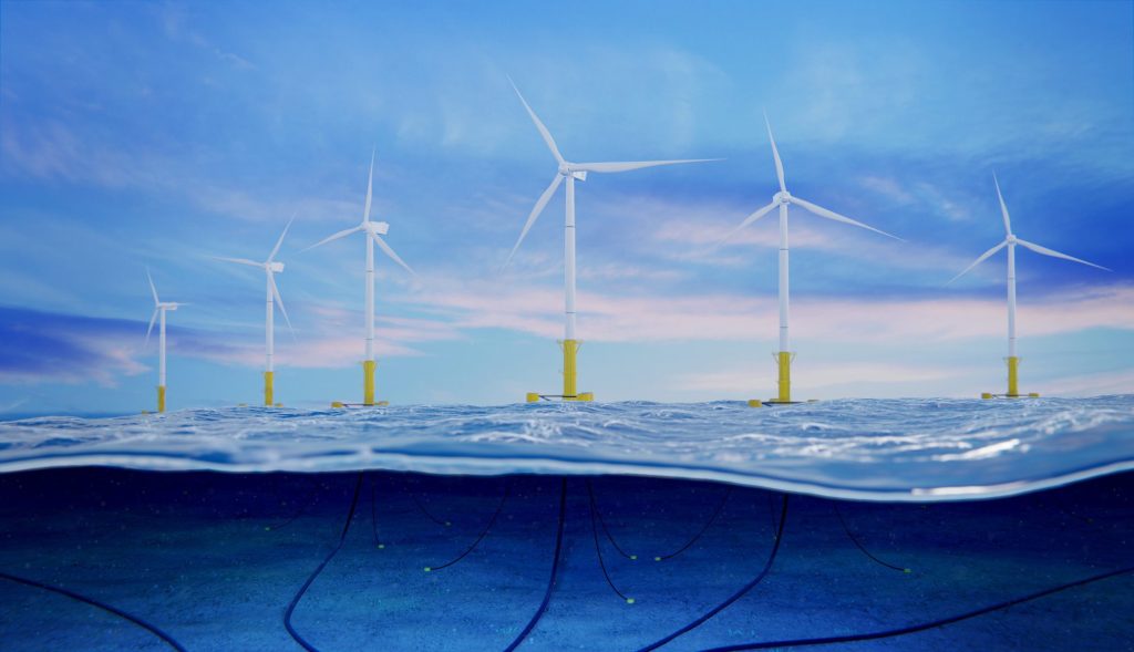 A transatlantic group of wind turbines in the ocean.